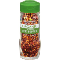 McCormick Gourmet Organic Crushed Red Pepper bottle adds vibrant heat to pasta.