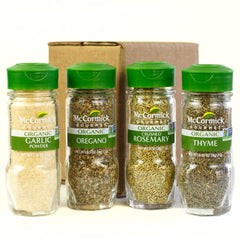 McCormick Gourmet Organic herbs shown ready to flavor roasted chicken and vegetables