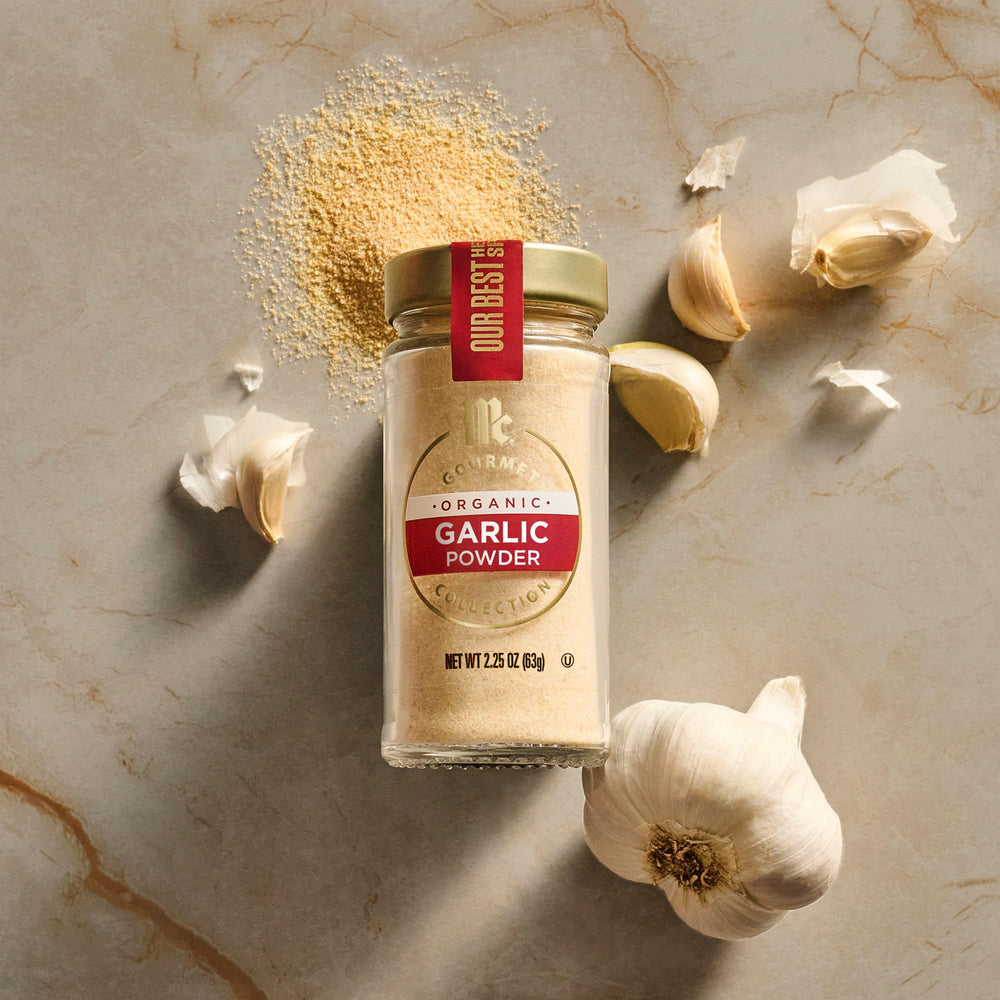 McCormick Gourmet Organic Garlic Powder kitchen scene suggests versatile home cooking.