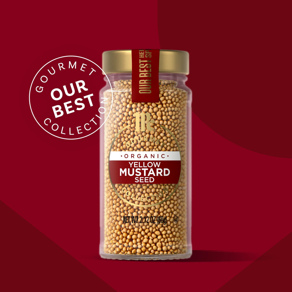 McCormick Gourmet Organic Yellow Mustard Seed in a spice rack – ready to spice rubs.