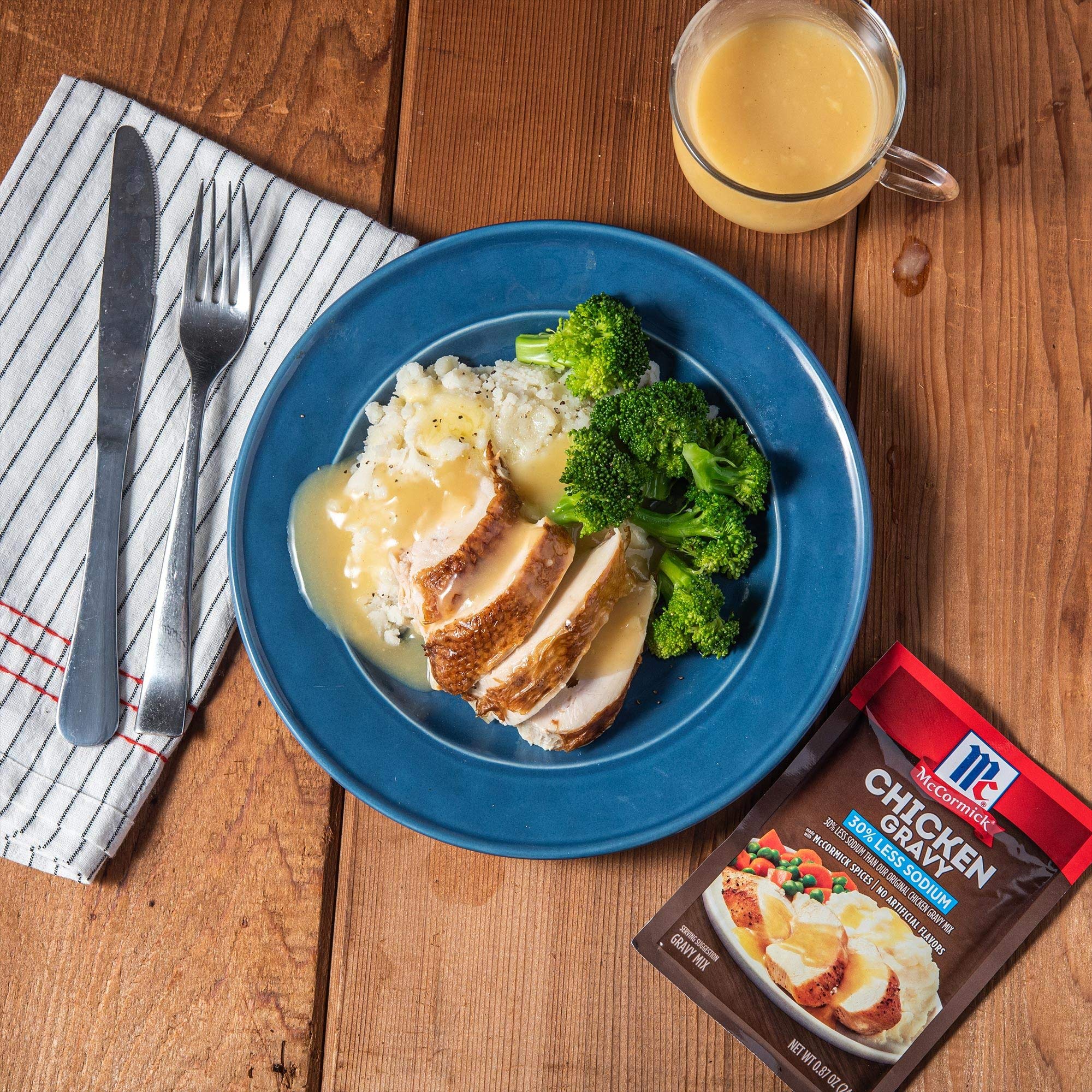 McCormick gravy pouring over mashed potatoes for comfort.
