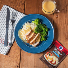 McCormick gravy pouring over mashed potatoes for comfort.