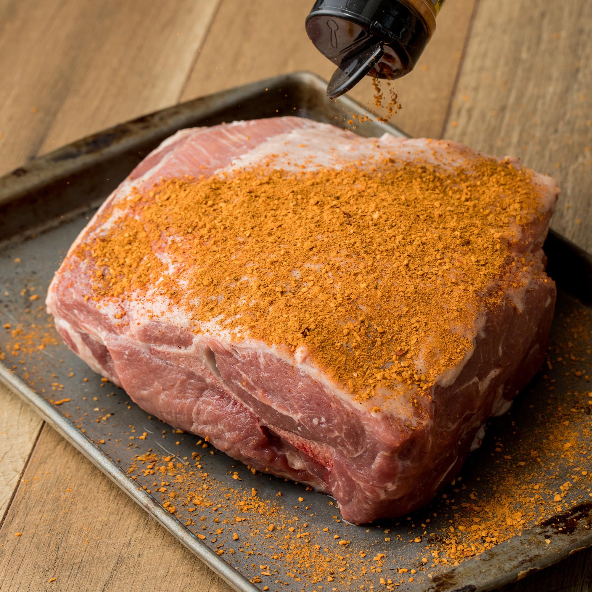 Grill setup with McCormick Applewood Rub for ready seasoning