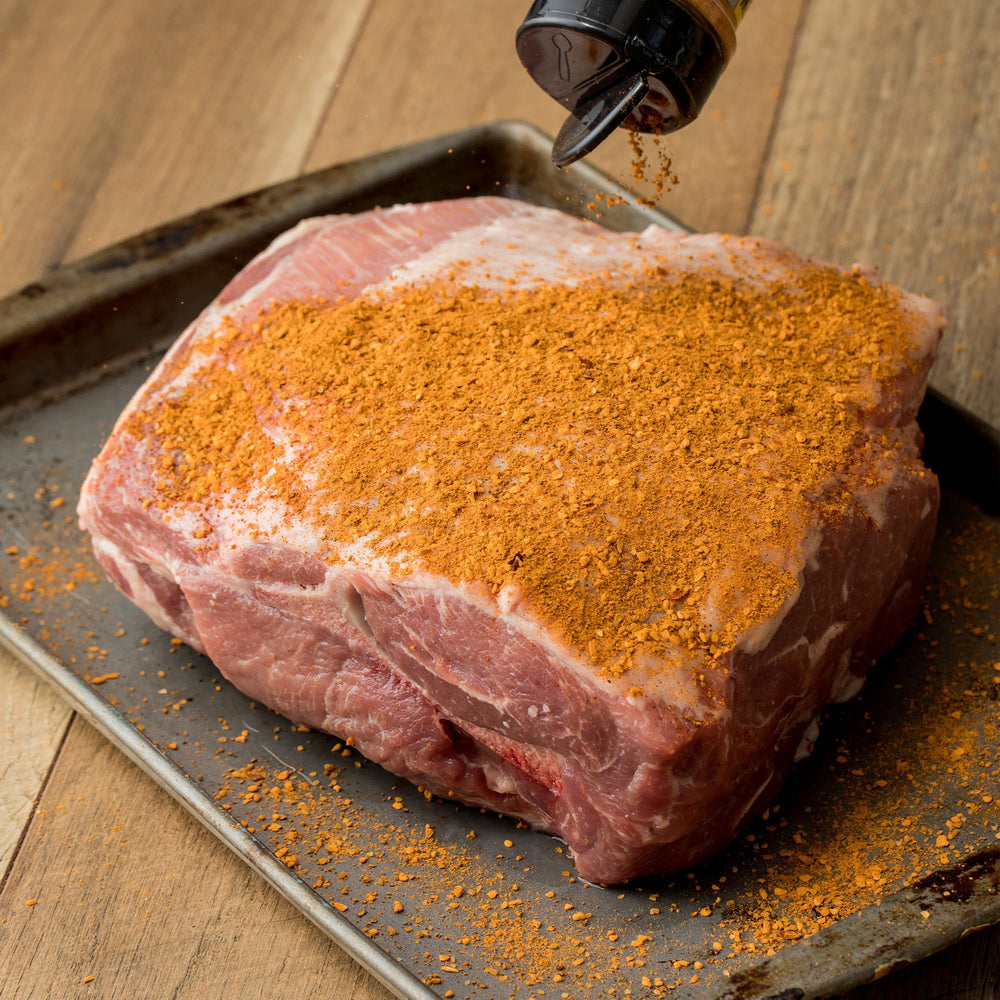 Grill setup with McCormick Applewood Rub for ready seasoning