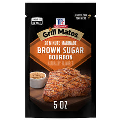 McCormick Grill Mates Brown Sugar Bourbon marinade bottle poured over chicken for quick flavor