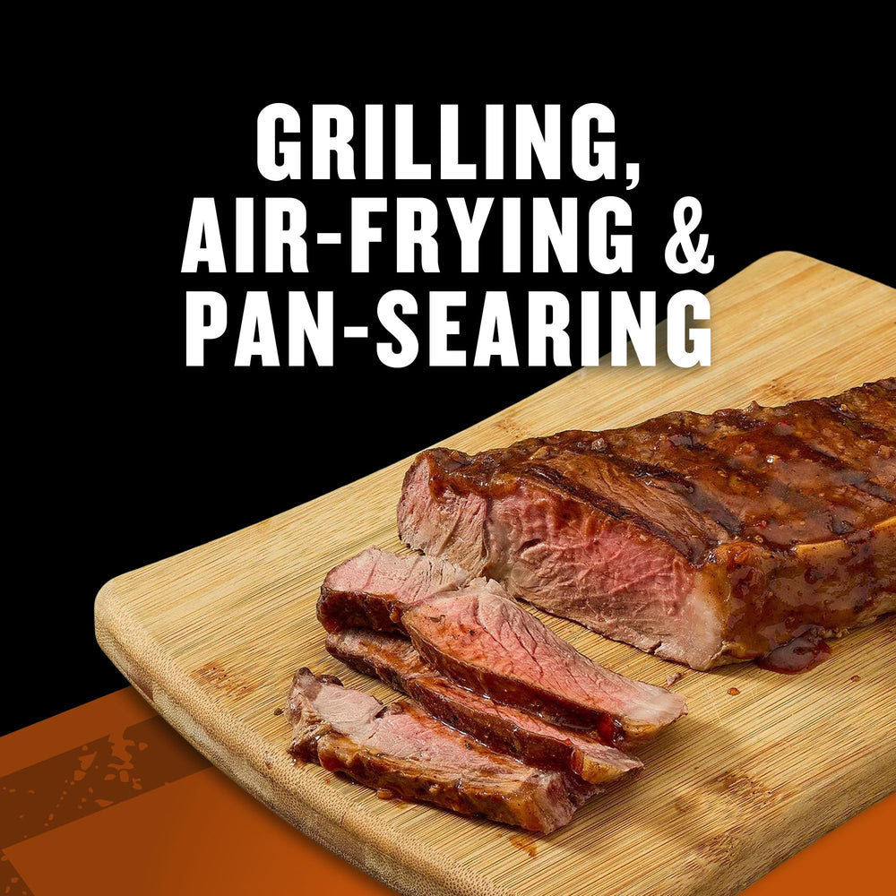Grilling scene shows McCormick Grill Mates marinade ingredients on the counter