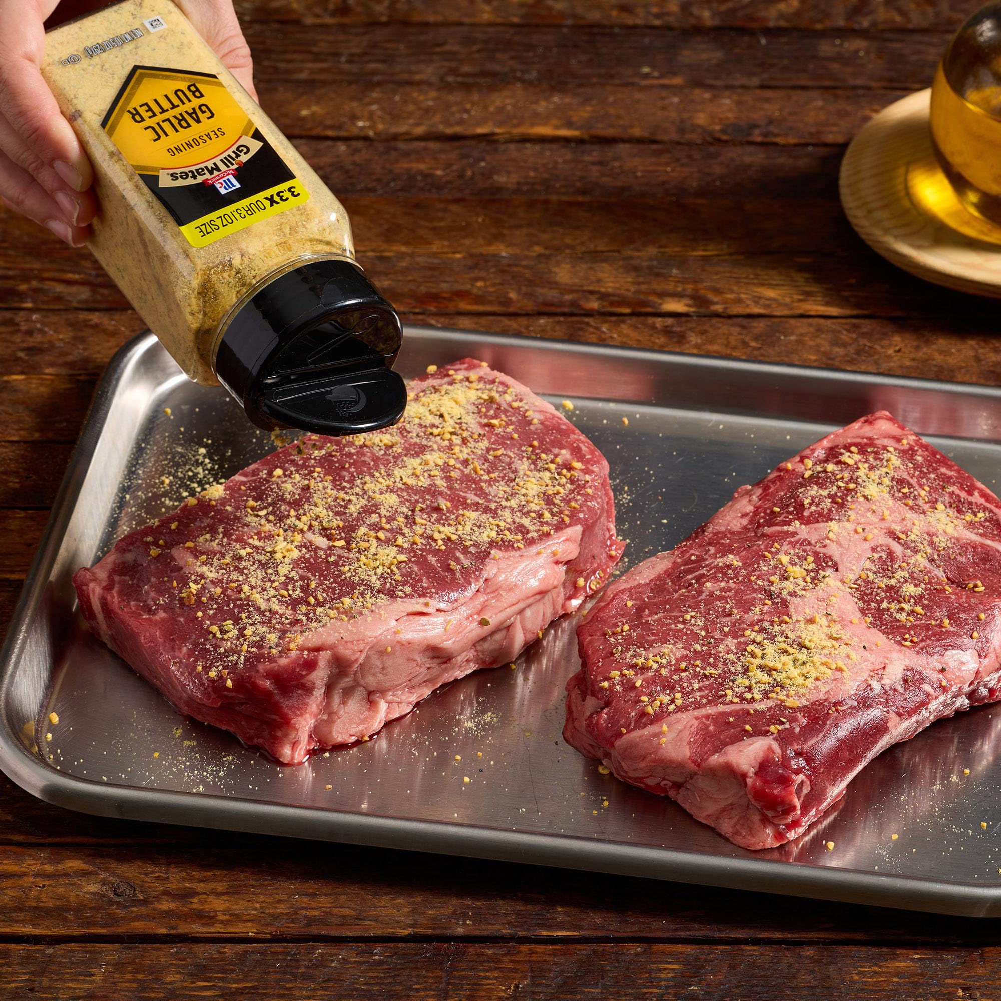 McCormick Grill Mates Garlic Butter Seasoning bottle close-up ready for grilling