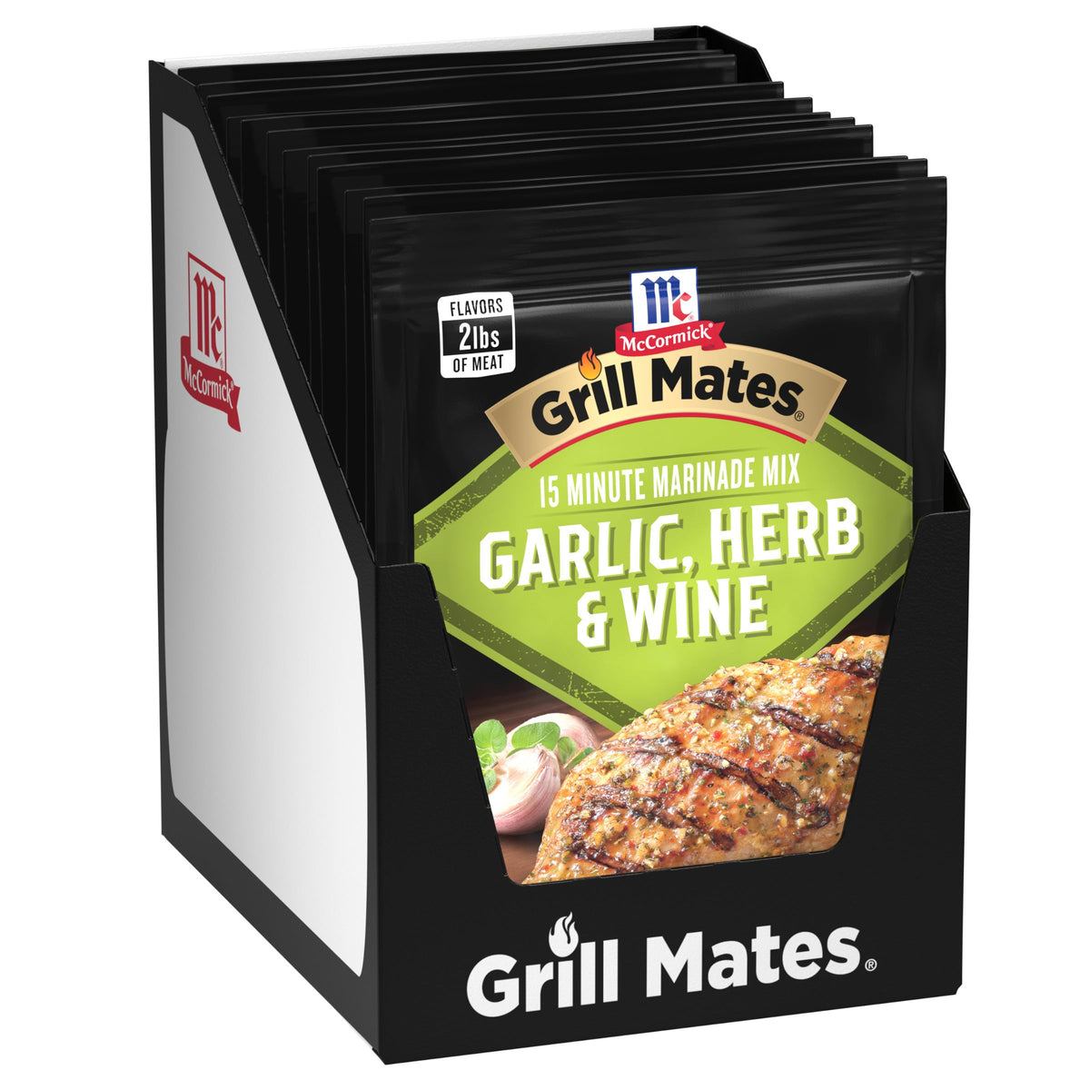 McCormick Grill Mates garlic-herb-wine marinade pack on counter ready to flavor proteins.