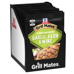 McCormick Grill Mates garlic-herb-wine marinade pack on counter ready to flavor proteins.