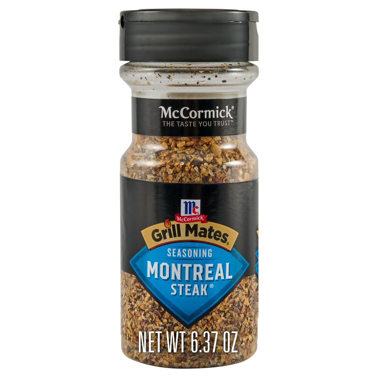 McCormick Grill Mates Montreal steak seasoning bottle pour enhances grilling flavor.