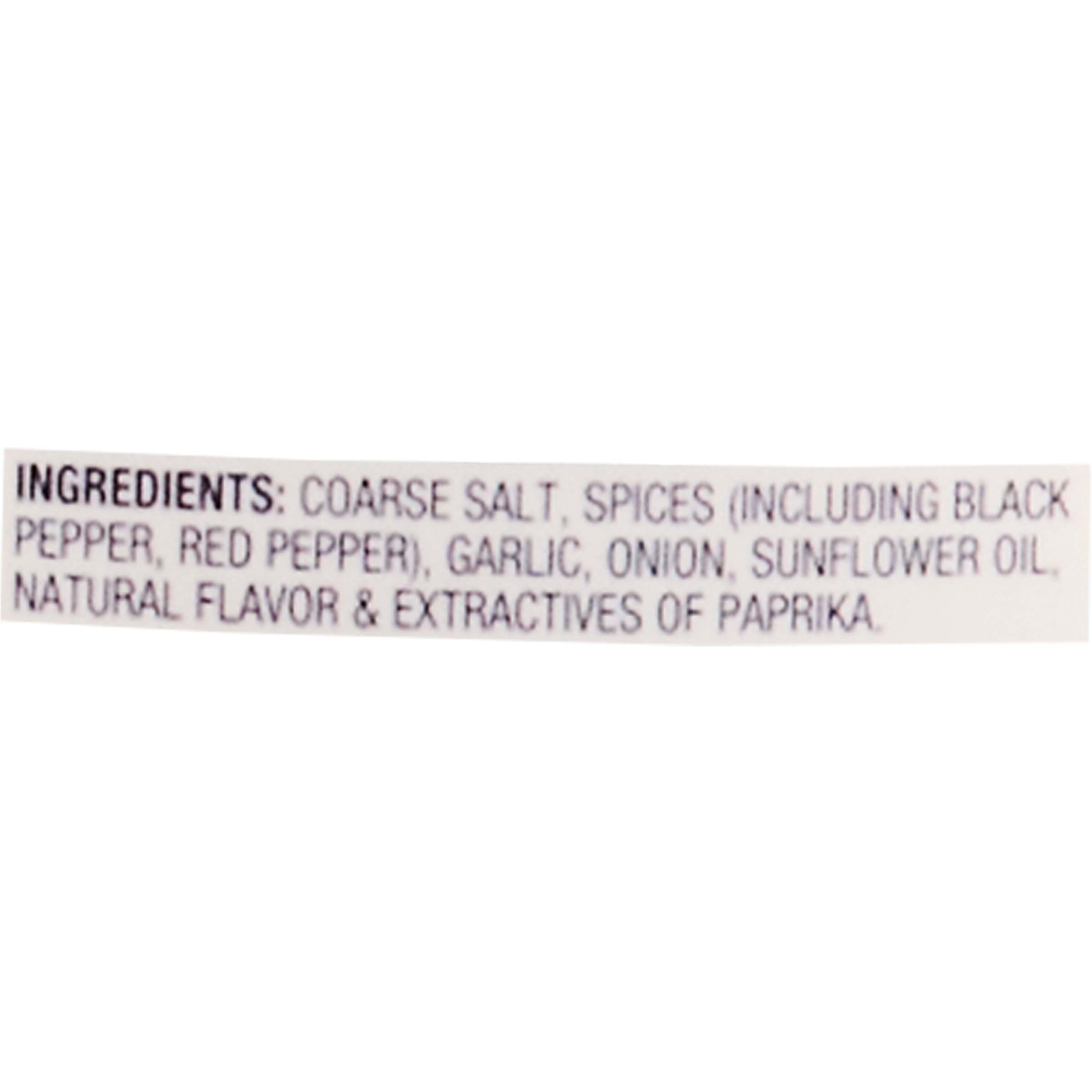 McCormick Grill Mates Montreal Steak Seasoning bottle close-up emphasizes coarse spices