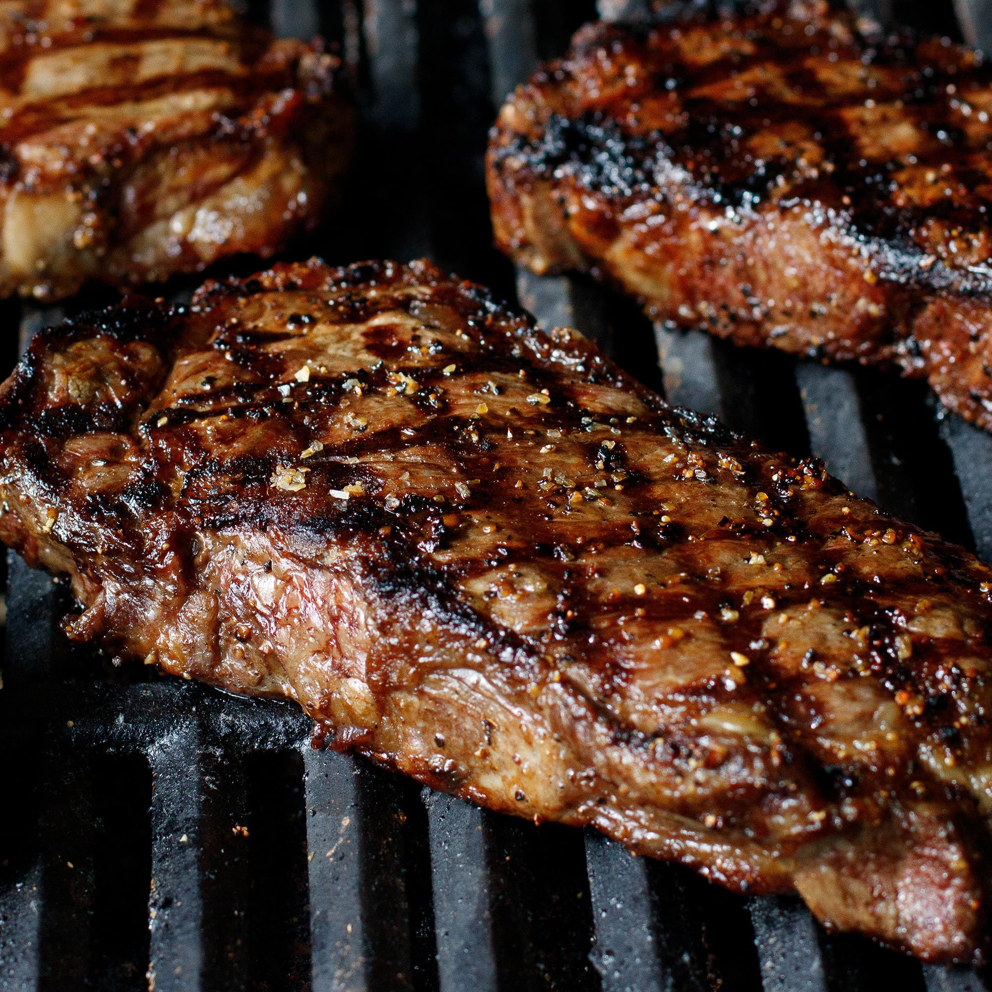 McCormick Grill Mates Montreal steak seasoning on a spice table hints at backyard flavor.