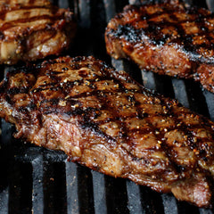 McCormick Grill Mates Montreal steak seasoning on a spice table hints at backyard flavor.