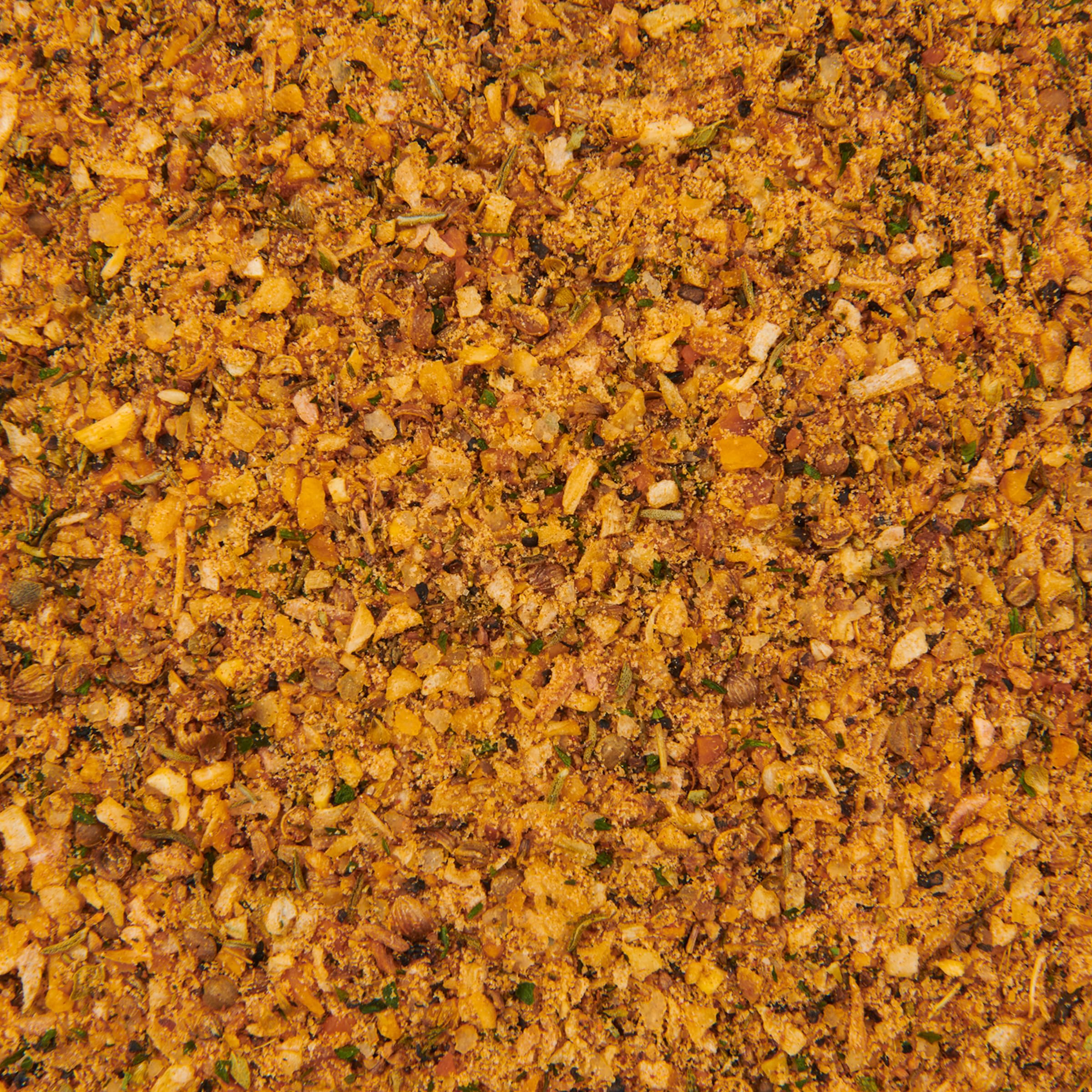 Family dinner featuring grilled meats seasoned with McCormick mix.