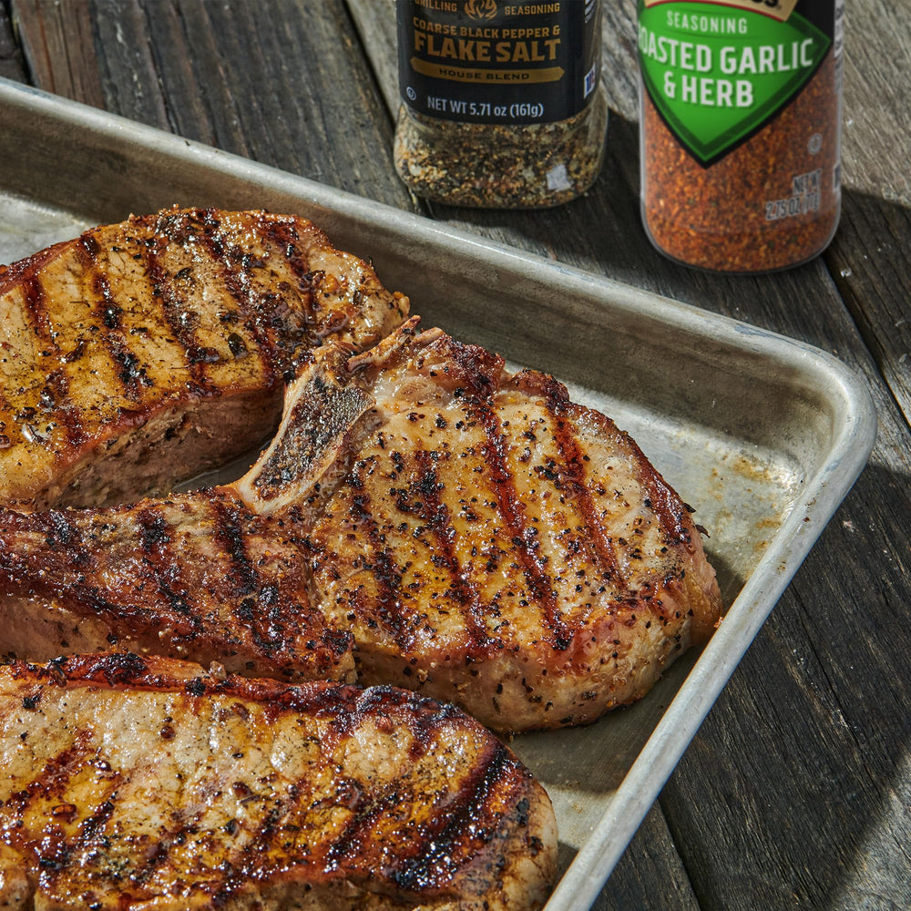 McCormick Grill Mates Roasted Garlic & Herb seasoning highlights beef chops with a savory crust