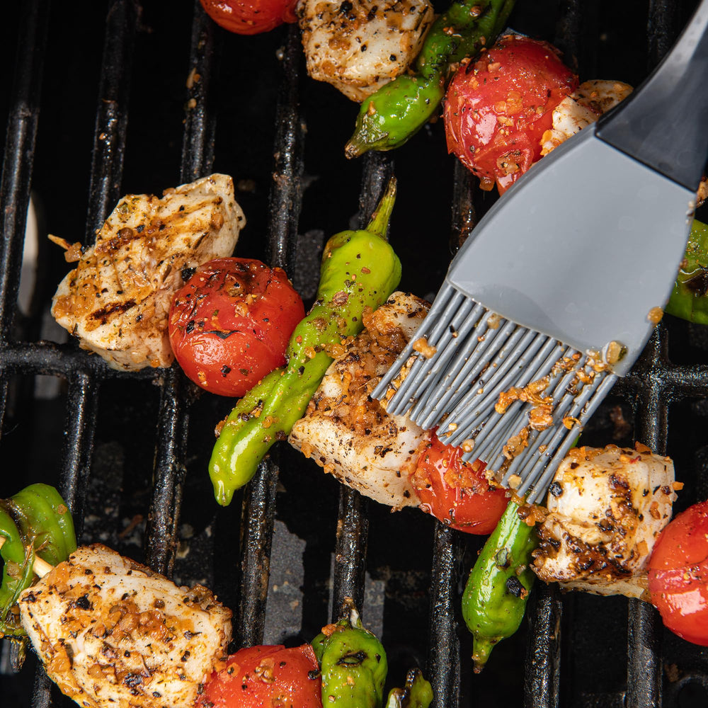 McCormick Grill Mates Roasted Garlic & Herb seasoning enhances seafood skewers with herby aroma