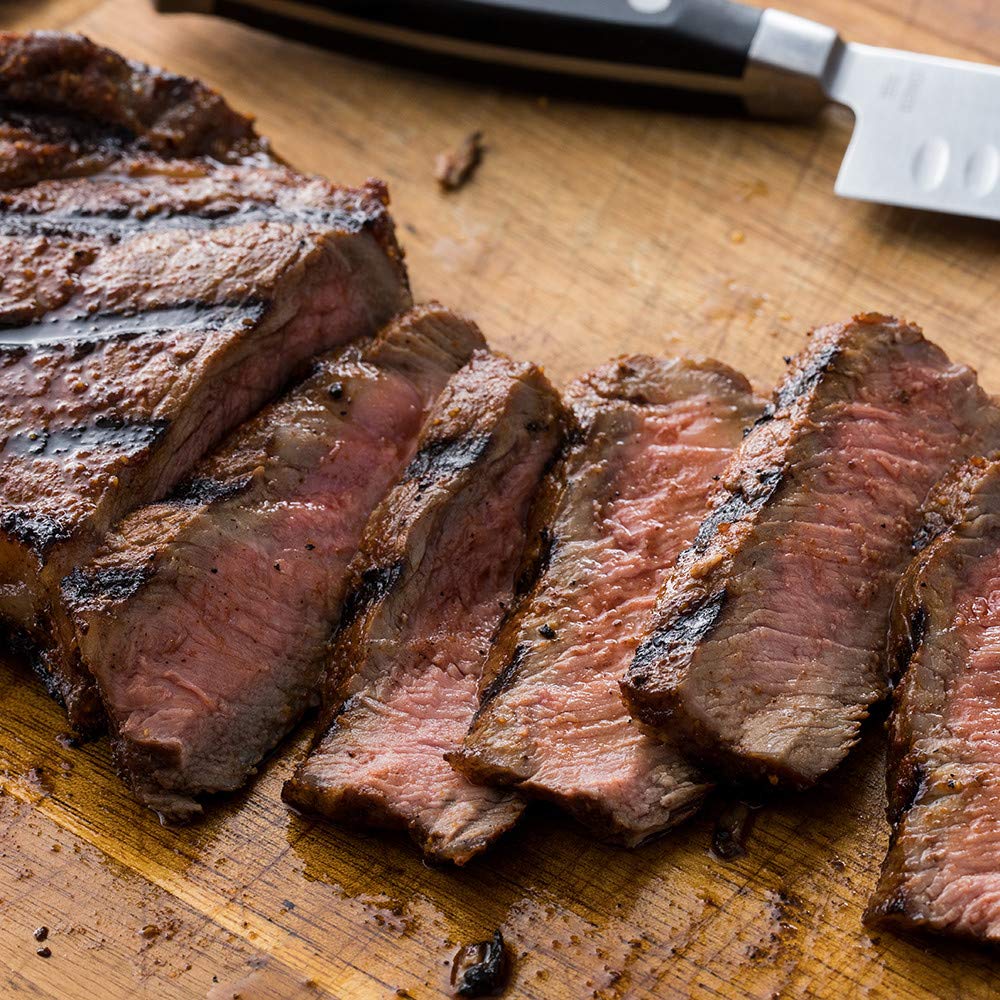 Pork ribs glazed with Sweet & Smoky rub on grill