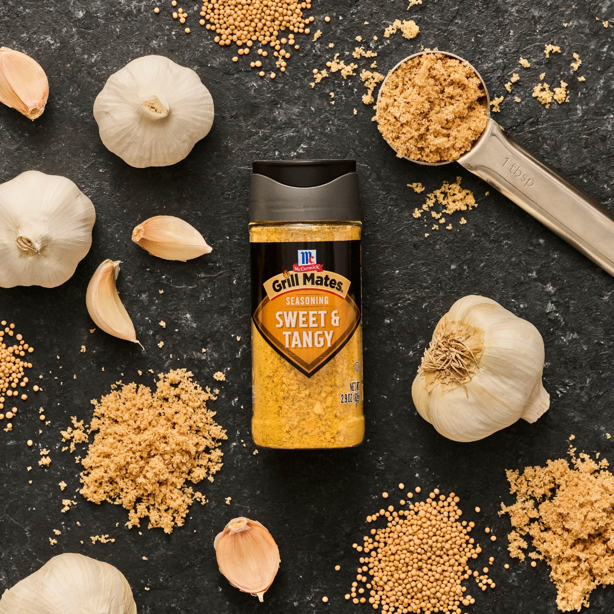 Family night grilling with McCormick Grill Mates Sweet Tangy enhances flavor.