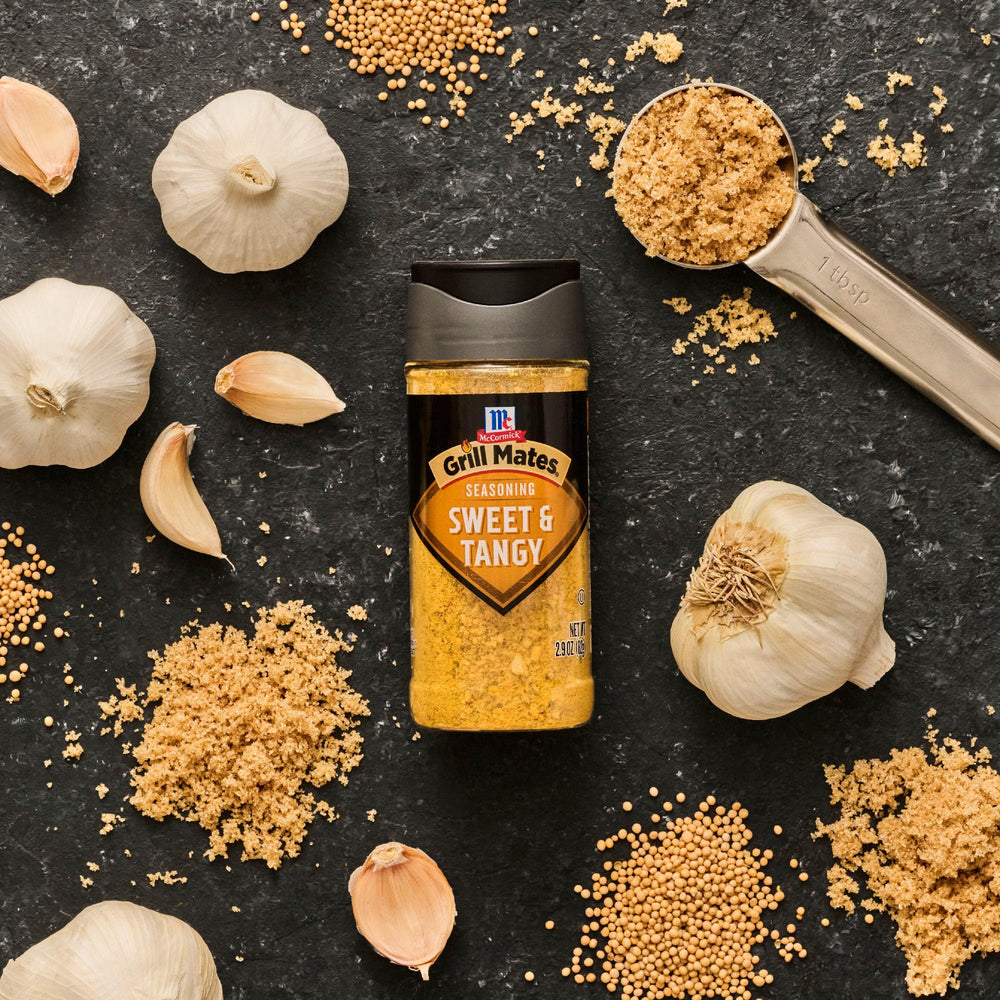 Family night grilling with McCormick Grill Mates Sweet Tangy enhances flavor.