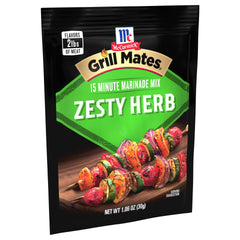 McCormick Grill Mates Zesty Herb Marinade Mix granules on spoon ready to mix.