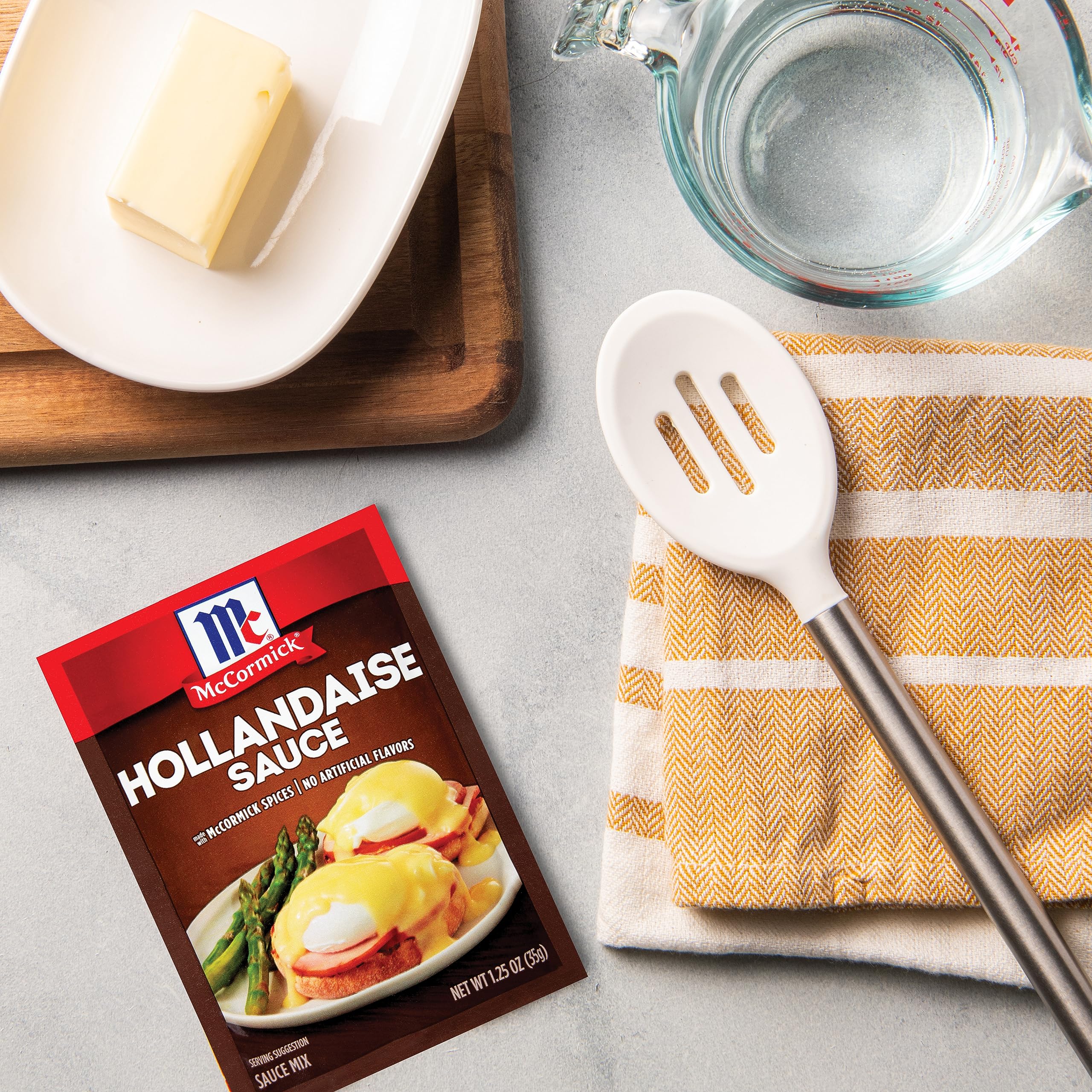 McCormick Hollandaise sauce over Eggs Benedict for brunch-ready flavor.