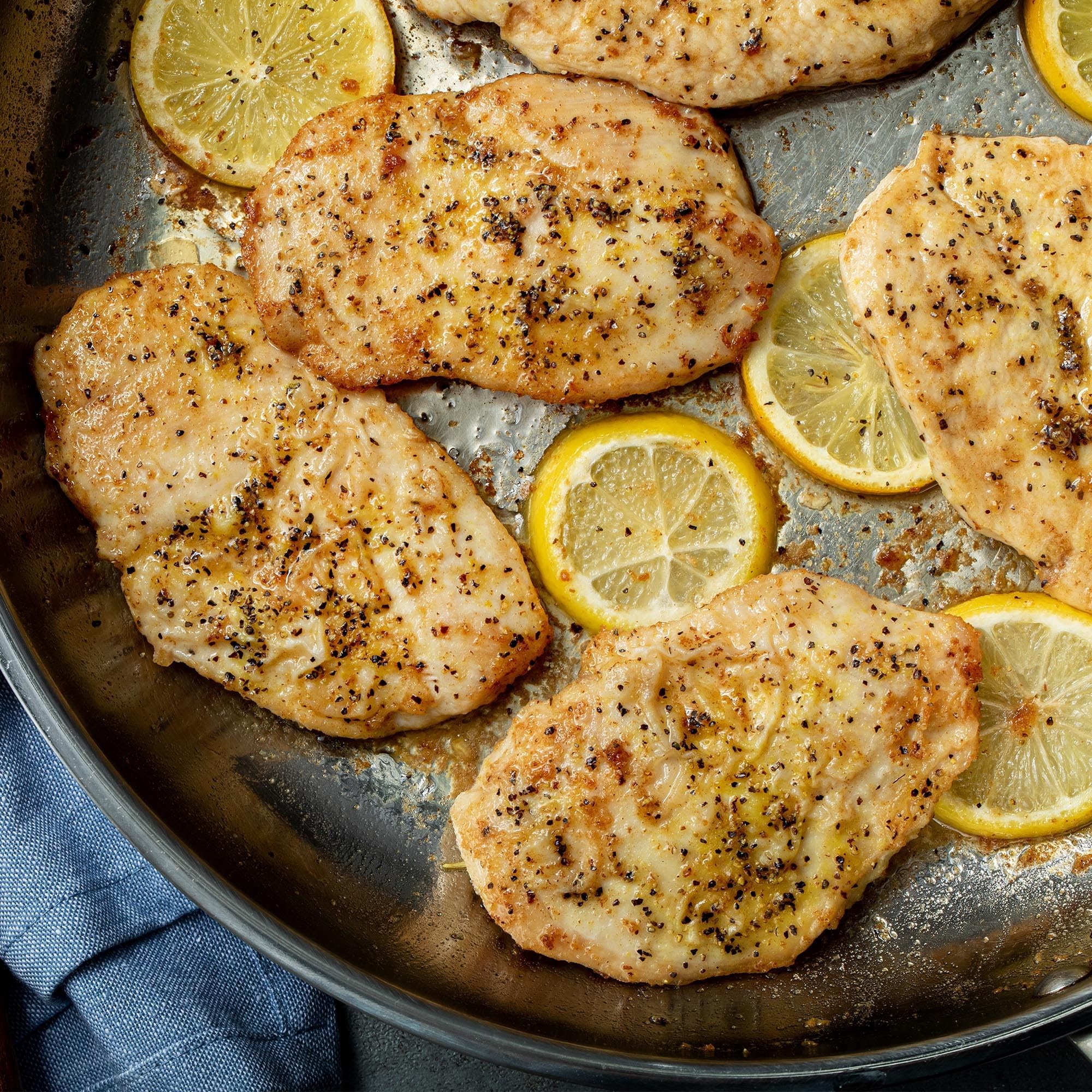 McCormick Lemon & Pepper on seafood dish enhancing aroma and flavor.