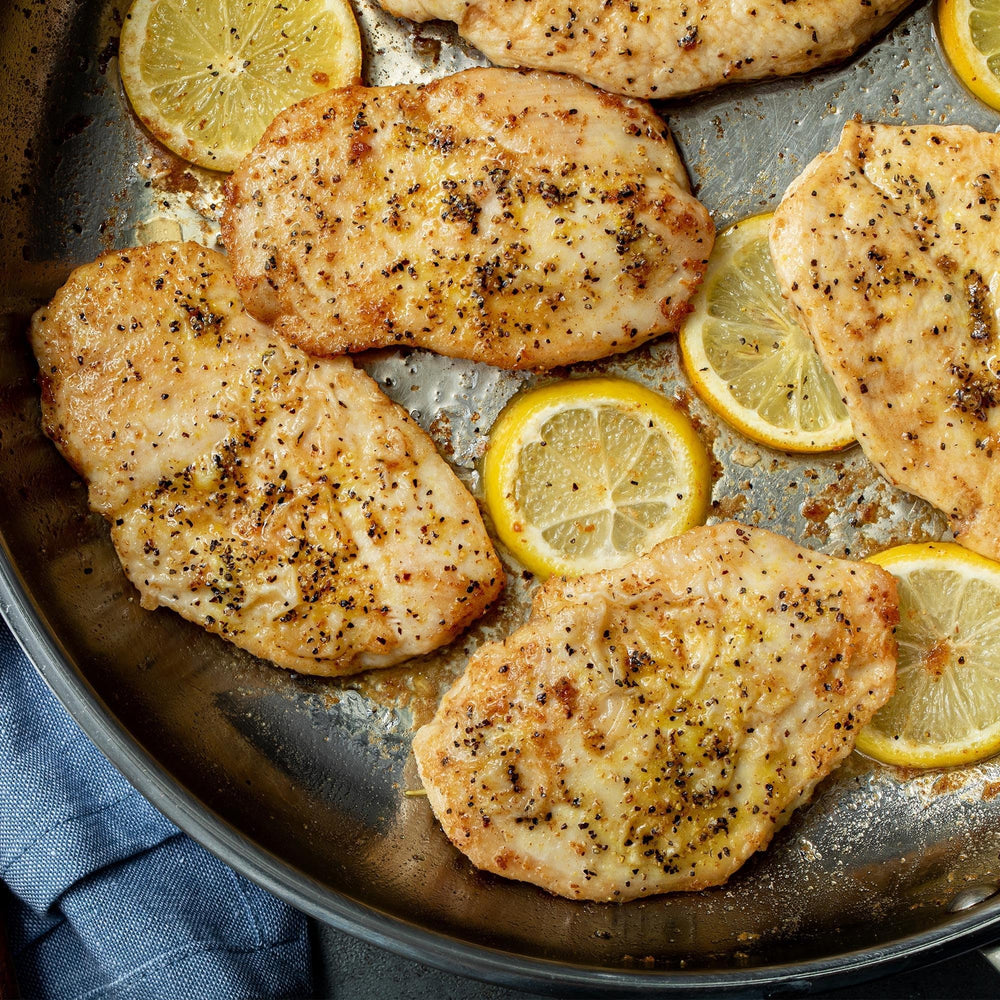 McCormick Lemon & Pepper on seafood dish enhancing aroma and flavor.