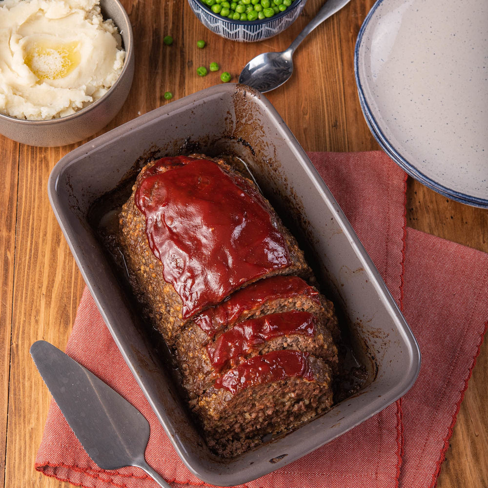 McCormick Meat Loaf Seasoning Mix family-dinner table ready for comfort.