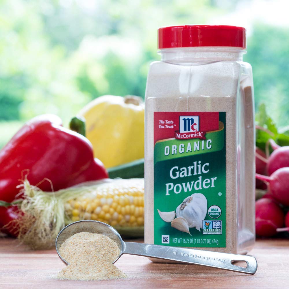 Refill bottle of McCormick Organic Garlic Powder ready to top up jars.