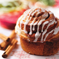 McCormick Organic Ground Saigon Cinnamon dusting on toast for warm aroma.
