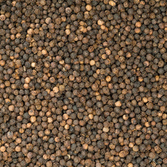 Peppercorns in grinder ready for table-side customization of heat