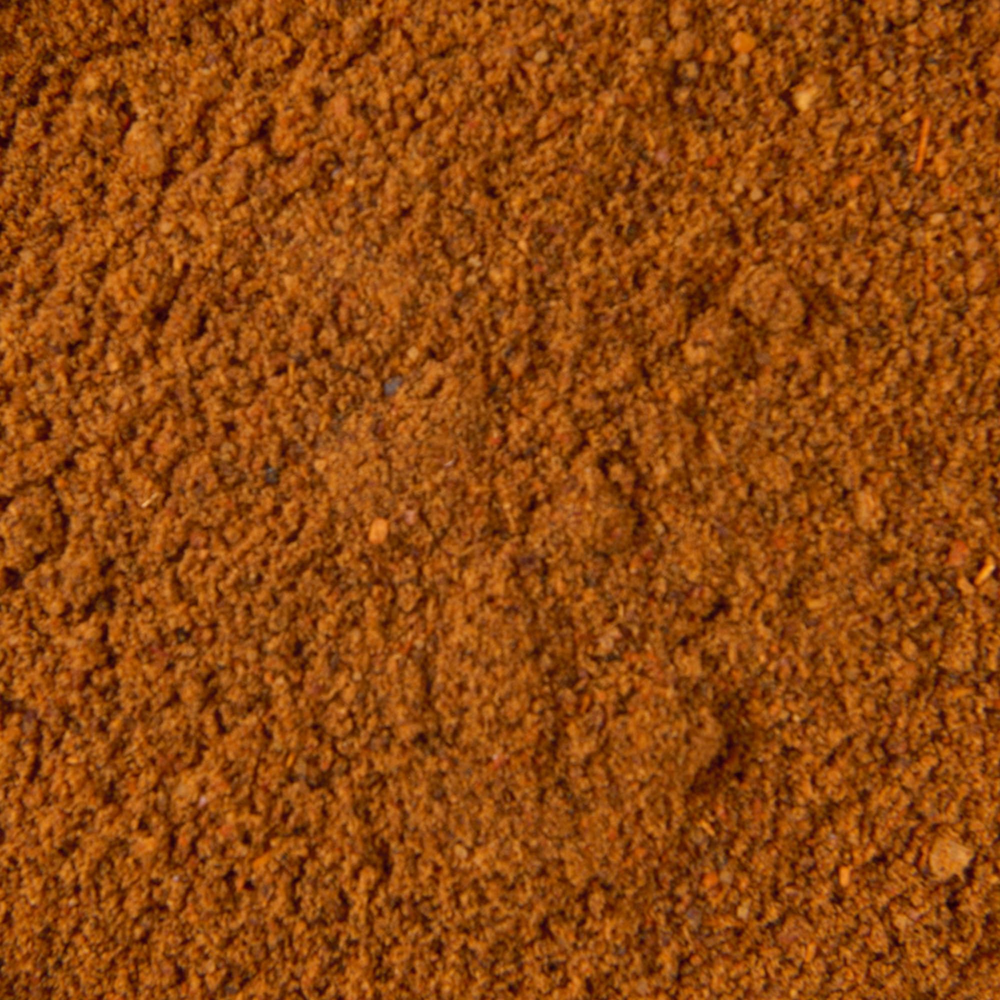 Kitchen scene with McCormick Original Chili Seasoning Mix in use