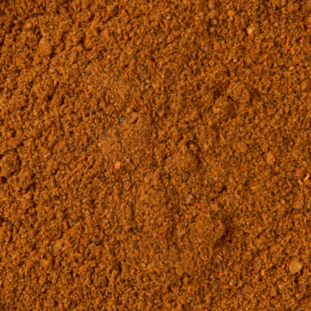 Kitchen scene with McCormick Original Chili Seasoning Mix in use