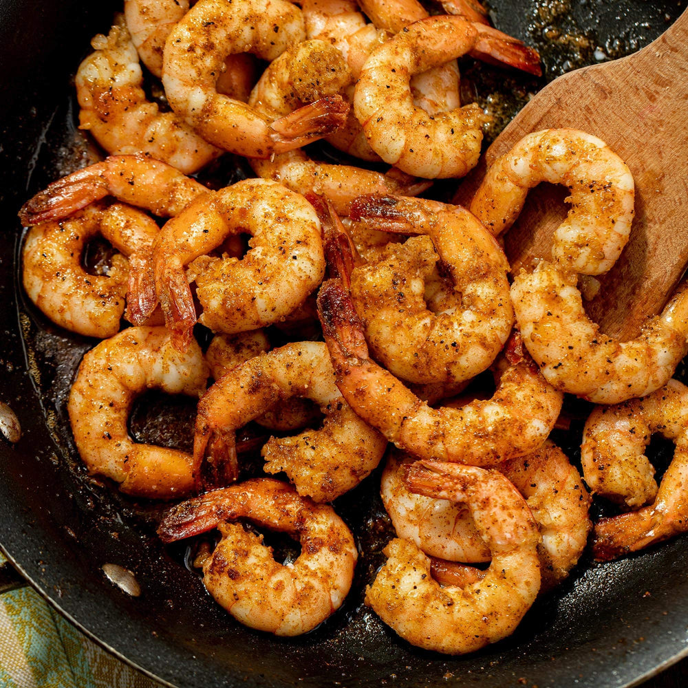 McCormick Perfect Pinch Cajun flip-top bottle enables precise, mess-free seasoning.