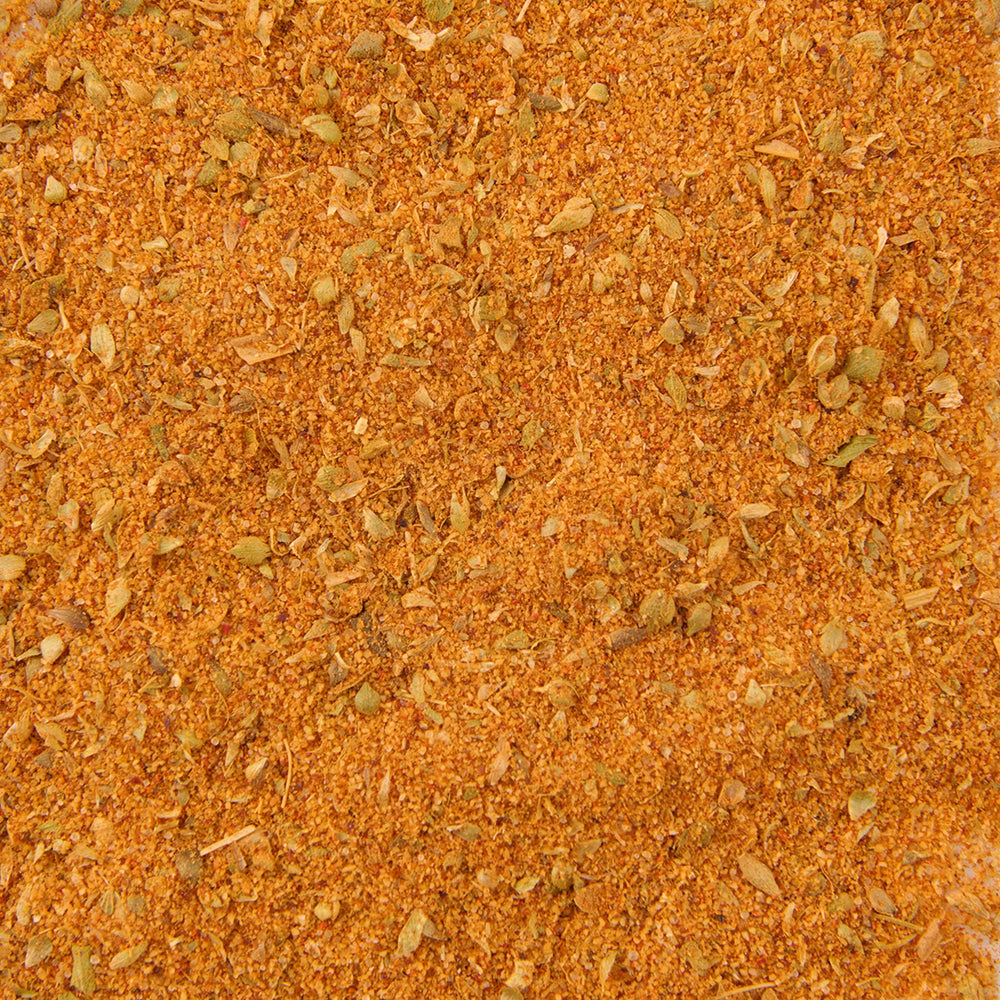 McCormick Perfect Pinch Cajun Seasoning over a steaming rice bowl