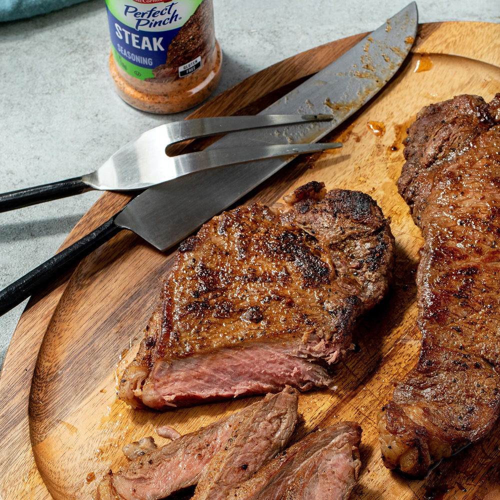McCormick Perfect Pinch steak seasoning bottle on counter.