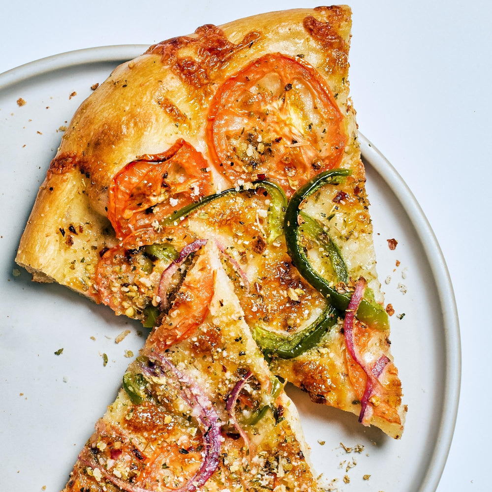 McCormick Pizza Topping Seasoning with garlic bread elevates savory garlic flavor.