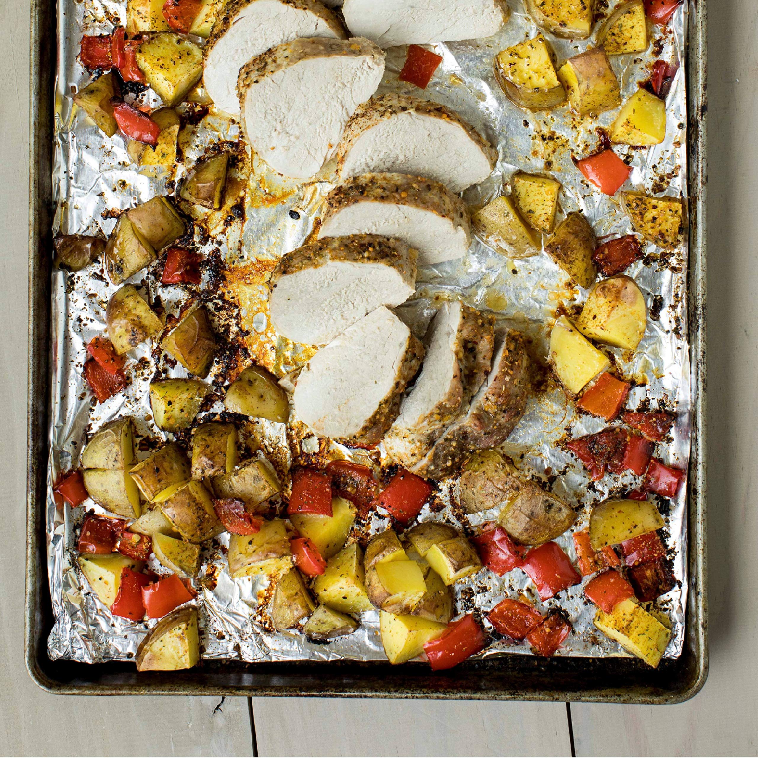 Pork and potatoes perk up with garlicky herb heat