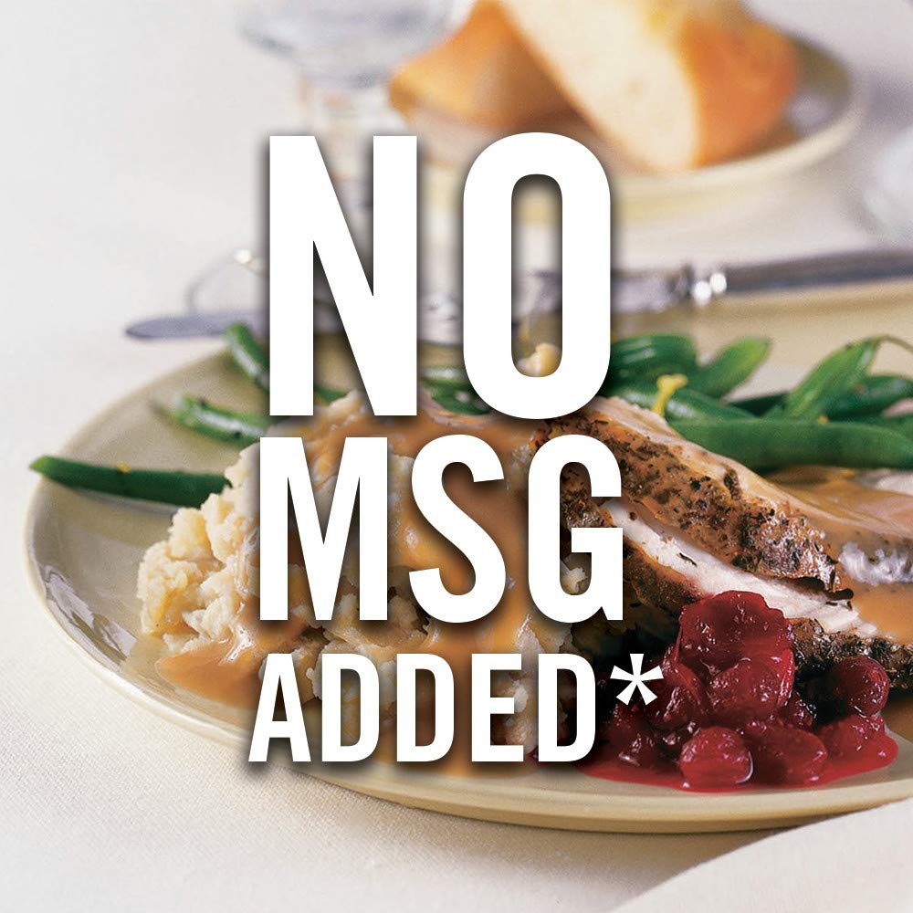 Mashed potatoes crowned with McCormick Poultry Gravy Mix drizzle.