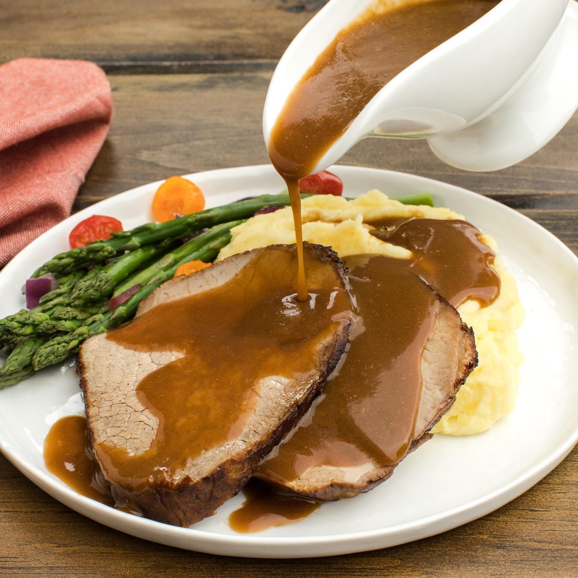 Mashed potatoes topped with rich brown gravy