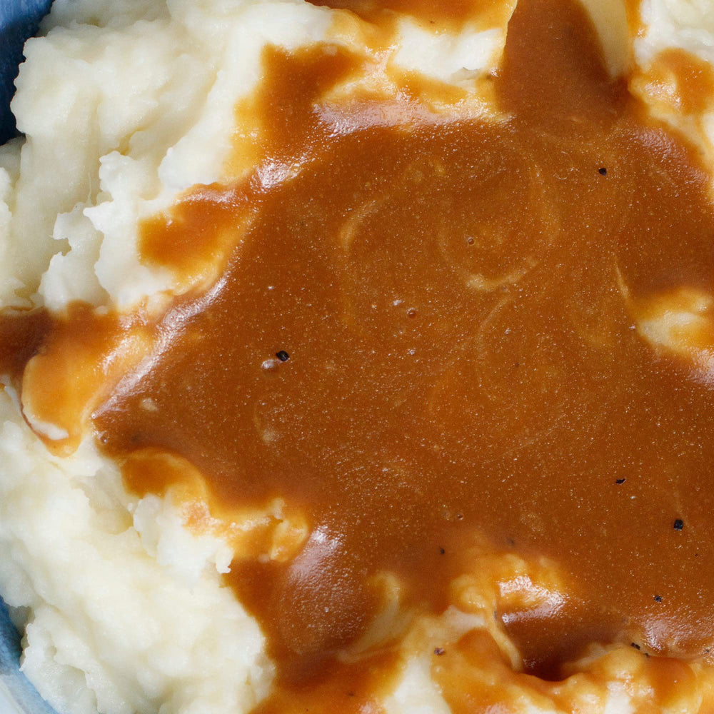 Thick gravy texture simmering in a pan
