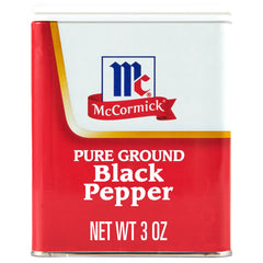 McCormick Pure Ground Black Pepper bottle close-up for seasoning salads and meals.