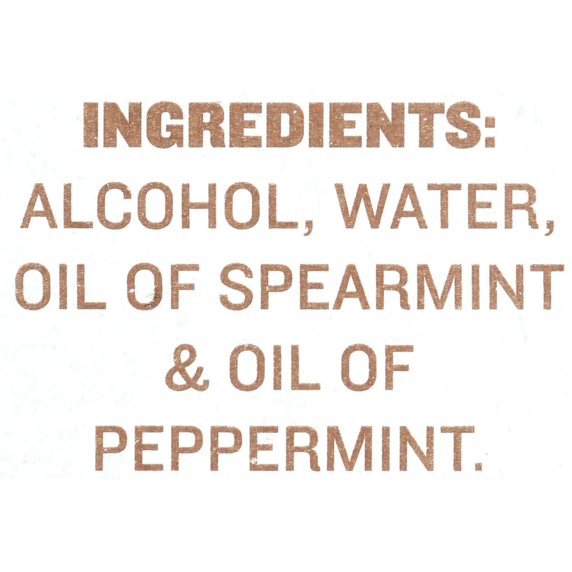 Gluten-free and non-GMO labeling on the McCormick mint extract bottle.