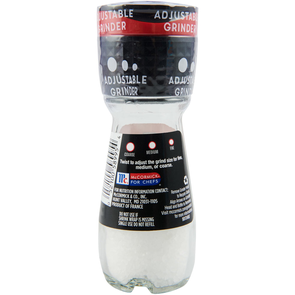McCormick Sea Salt Grinder in use at tabletop, customizable grind size for chef-approved flavor.