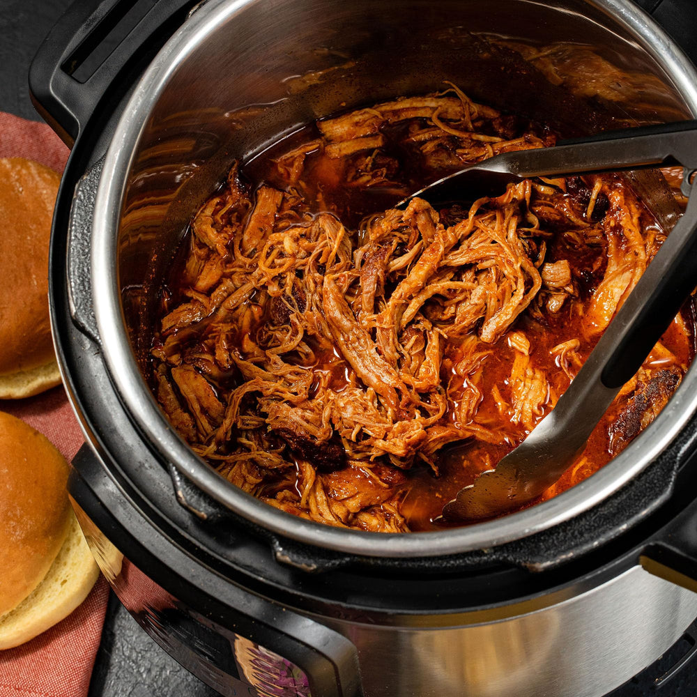 Slow cooker scene with McCormick seasoning preparing dinner