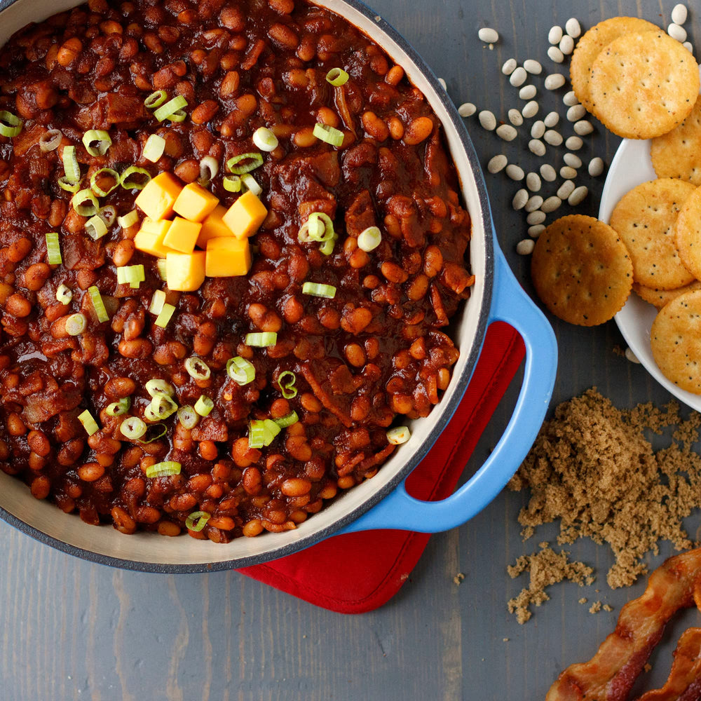 McCormick Tex-Mex Chili Seasoning over hot dogs with chili topping.