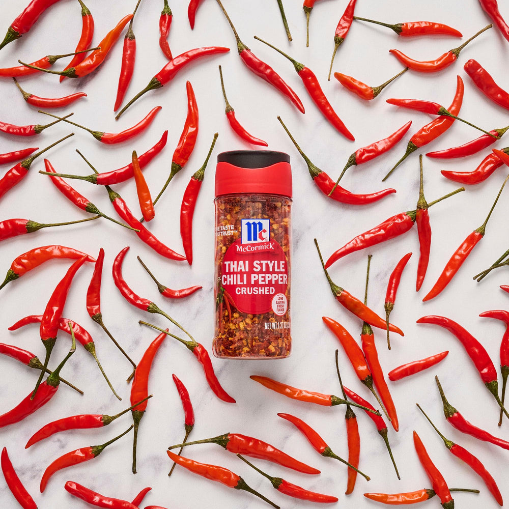 McCormick Thai Style Crushed Chili brightening green papaya salad flavor.