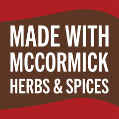 Ladle of McCormick turkey gravy mix served over mashed potatoes.