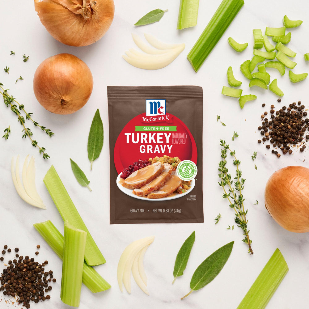 McCormick gravy sauce poured over stuffing and vegetables