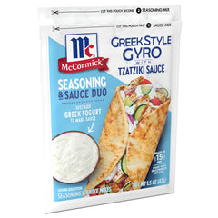 McCormick tzatziki sauce mix swirling into creamy tzatziki for dipping.
